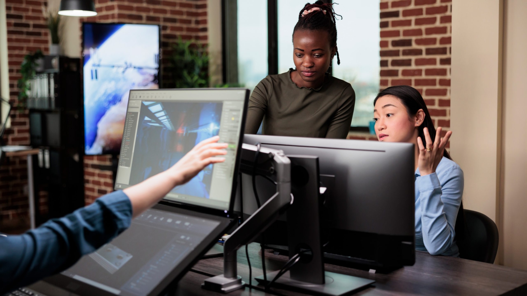 game-developers-discussing-team-workflow-in-order-2023-11-27-05-23-54-utc