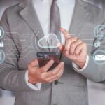 Businessman Enhancing Document Security and Accessibility with Cloud Technology
