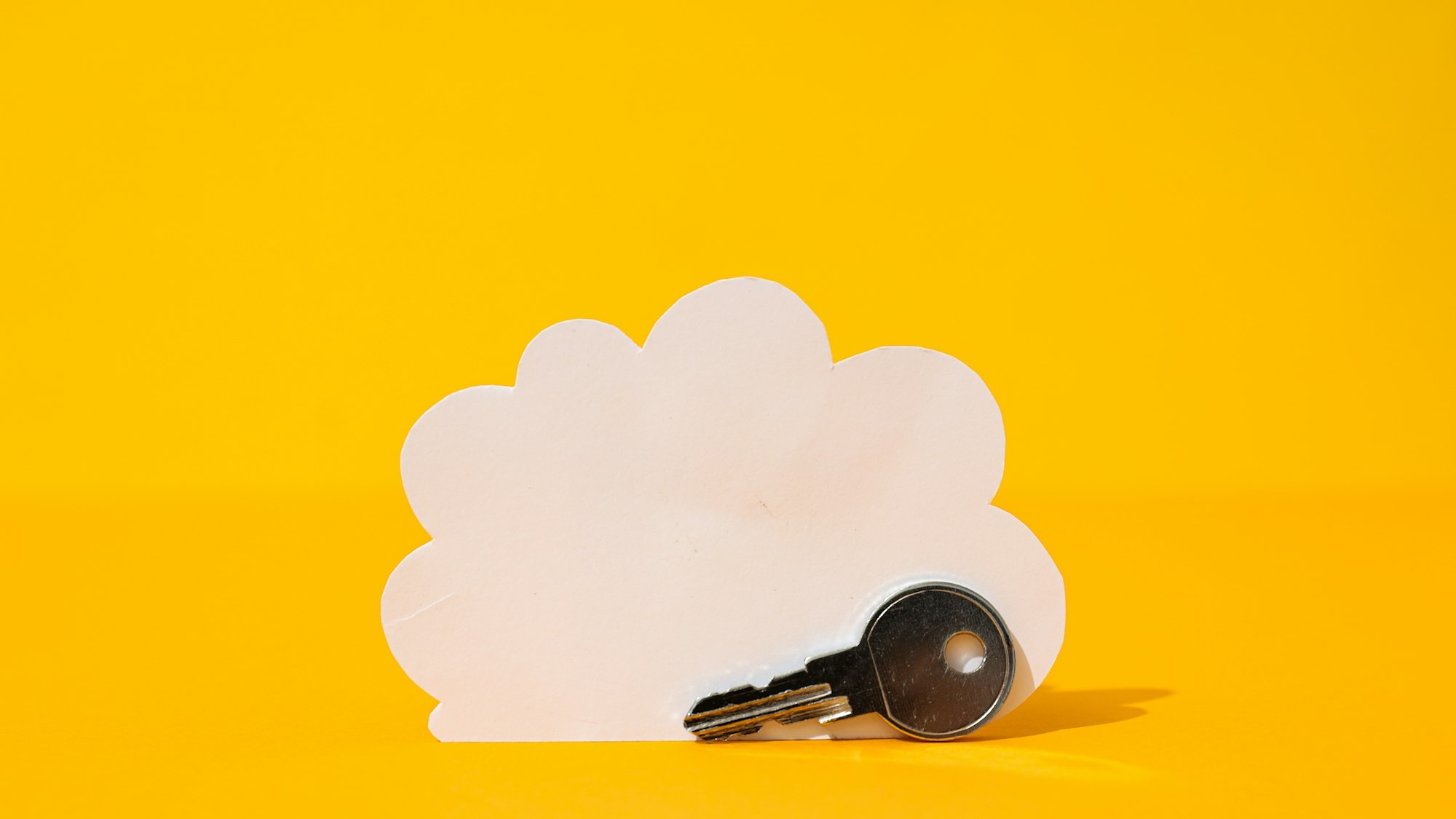White paper cloud with key, cloud computing concept