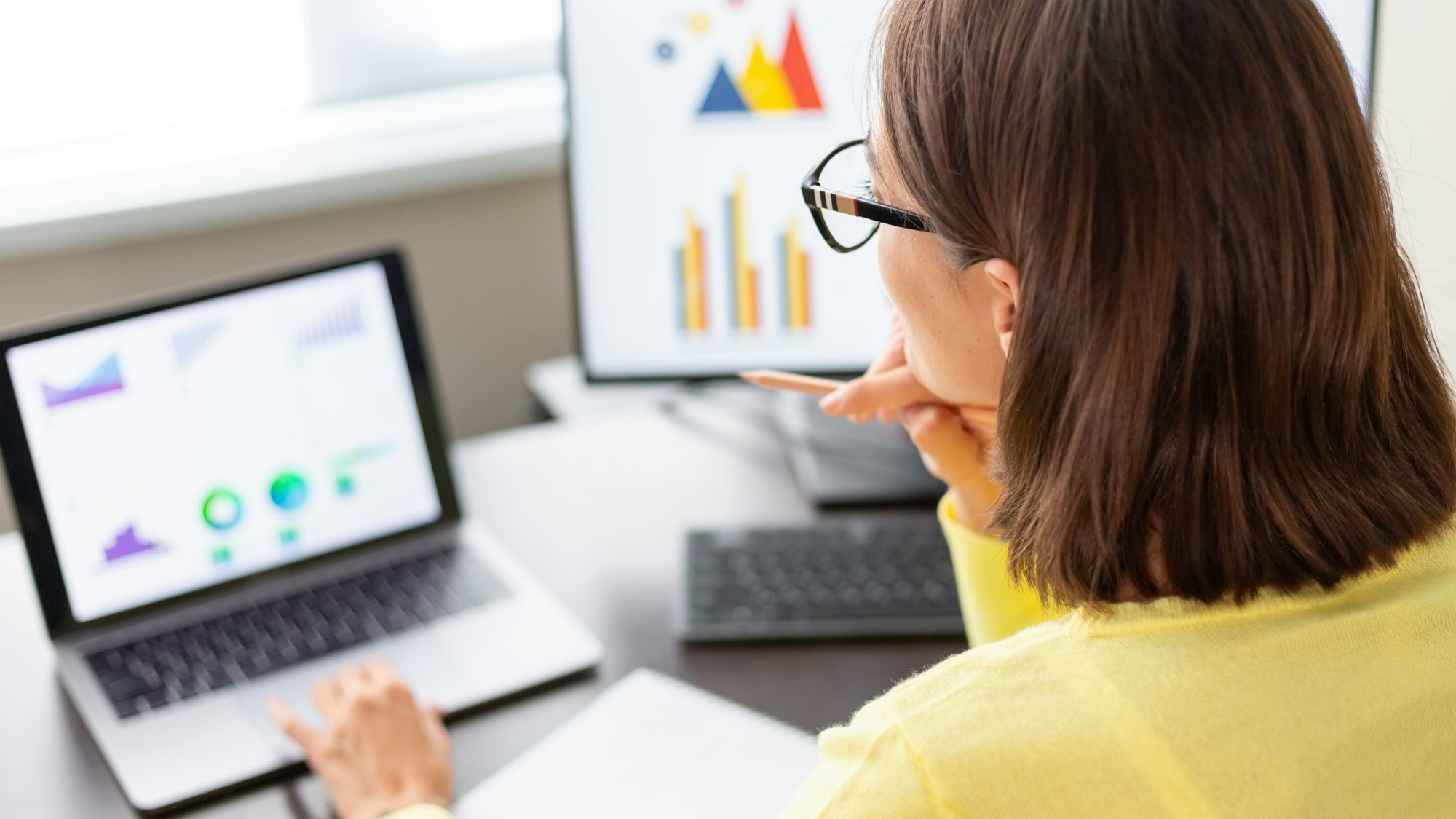 Caucasian advisor financial business analytics woman with data dashboard graphs