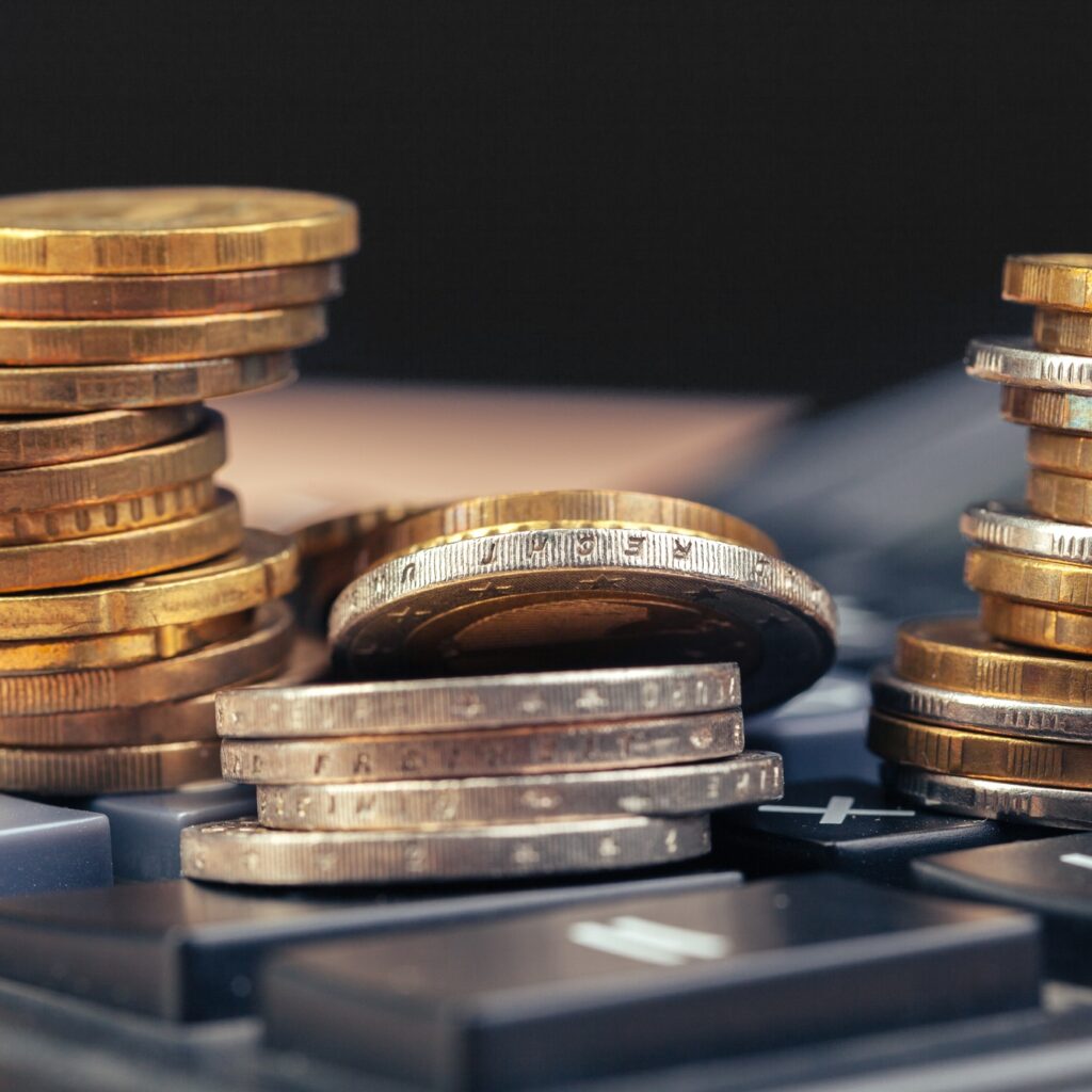 stack of coins and calculator,concept idea for business finance