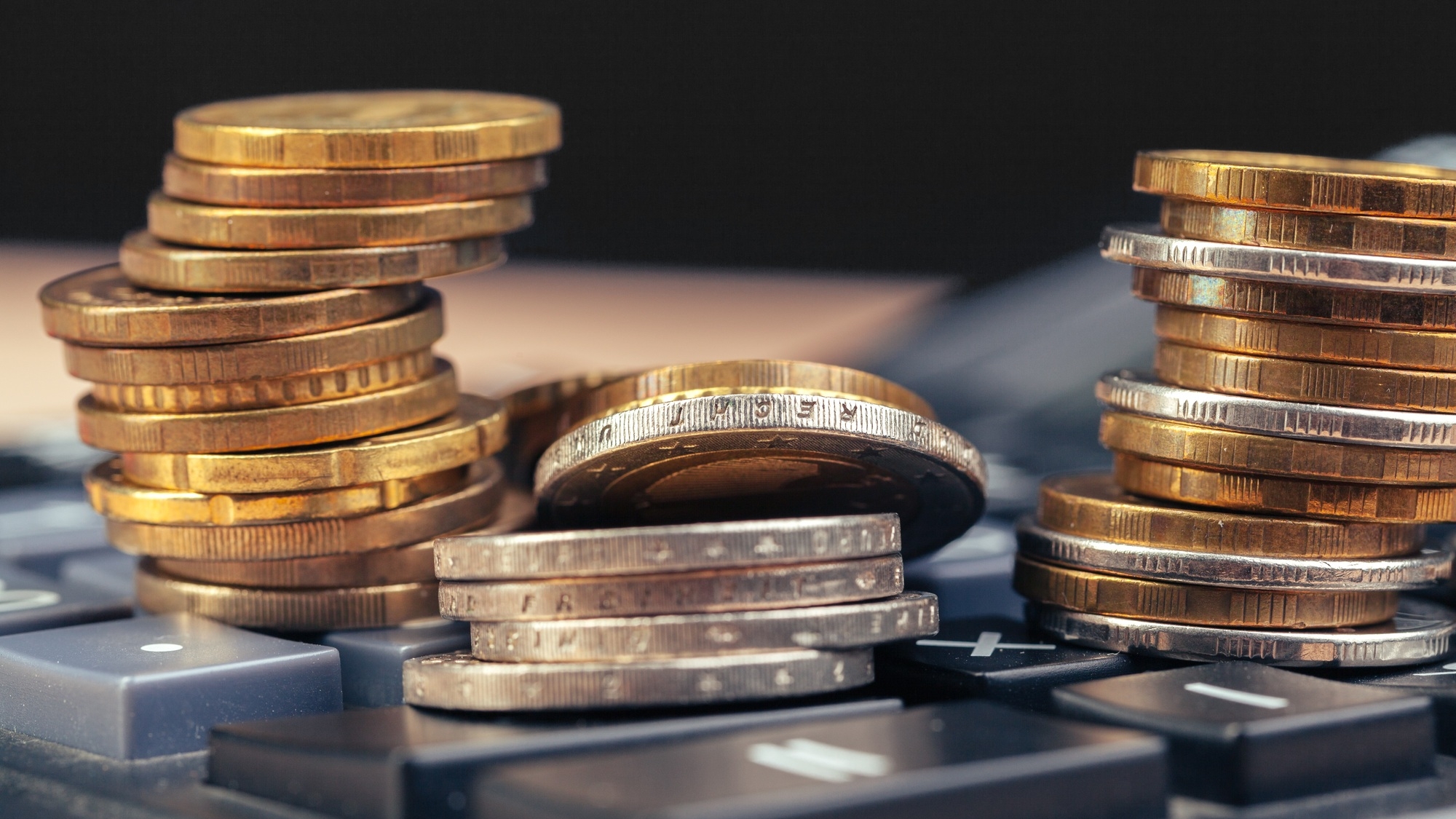 stack of coins and calculator,concept idea for business finance