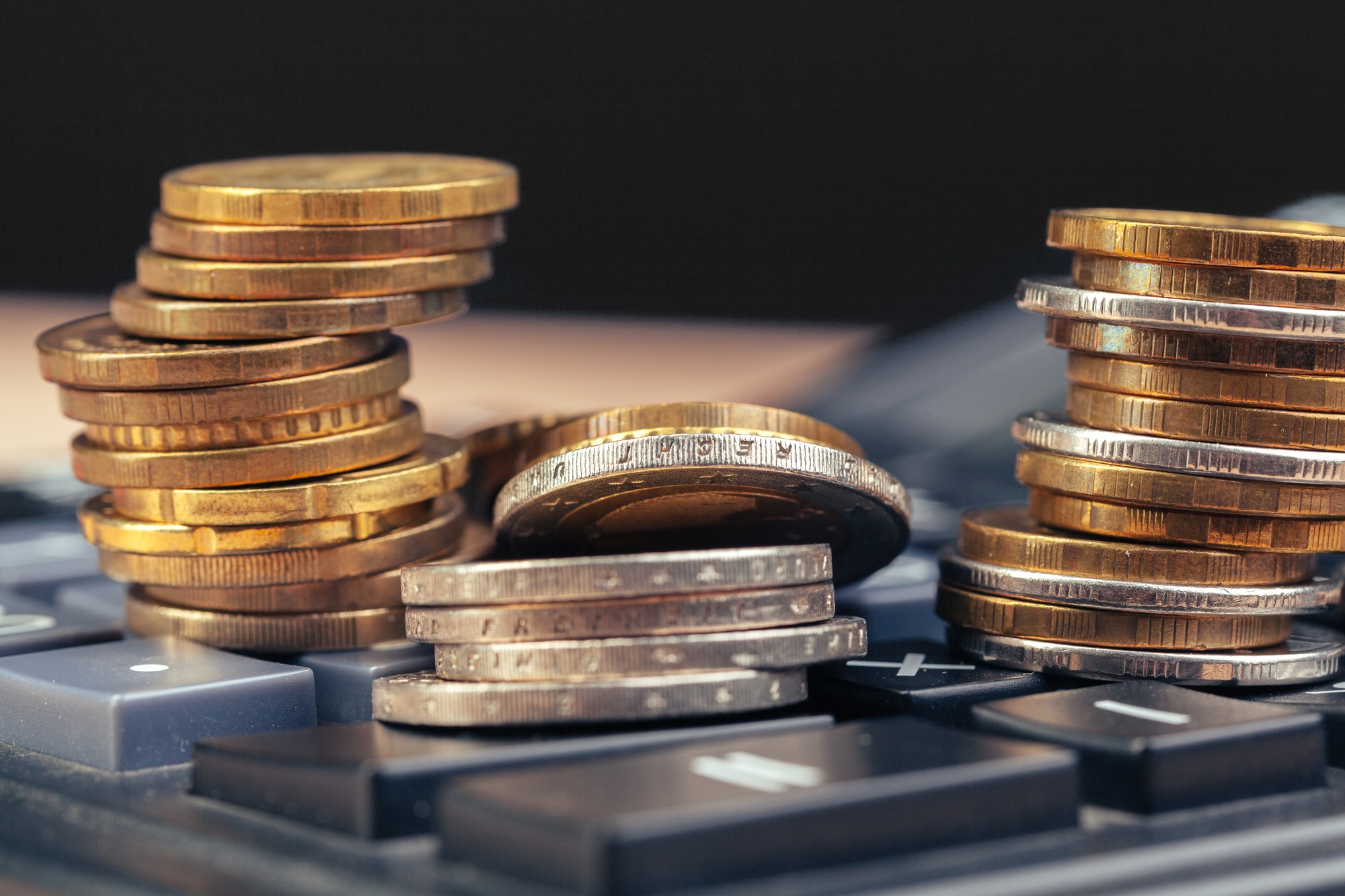stack of coins and calculator,concept idea for business finance