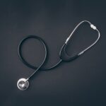 top view of stethoscope on gray surface