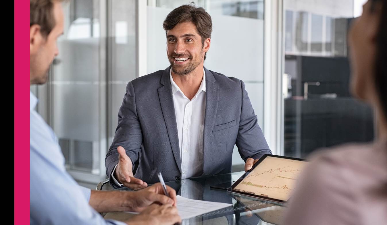 A JustSolve Microsoft consultant smiling during a client meeting