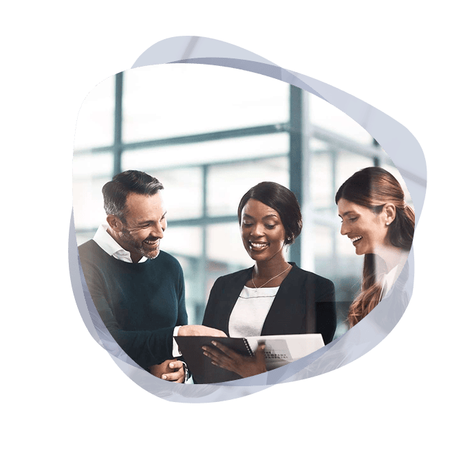 An enterprise architecture consultant meeting with her clients in an office.