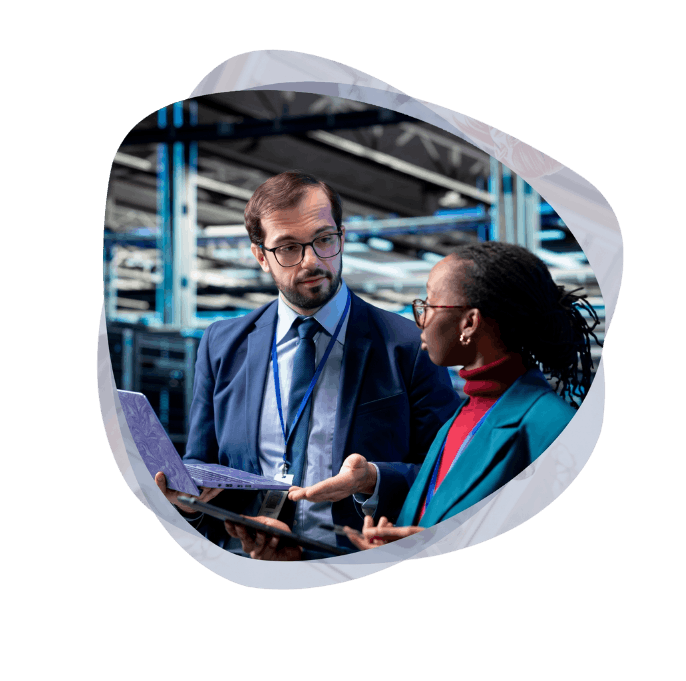 Consultants discussing the strategic implementation of Microsoft Agentic AI Development Services within an AI Centre of Excellence.