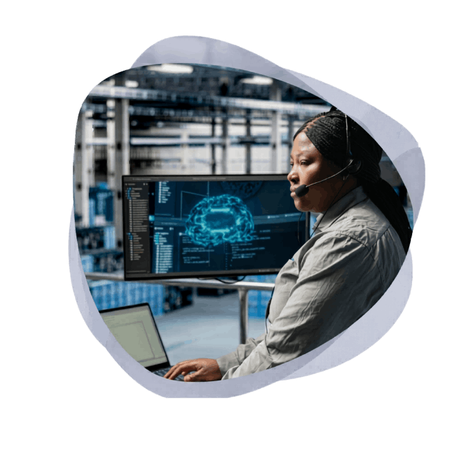 A technical specialist monitoring a business process dashboard.