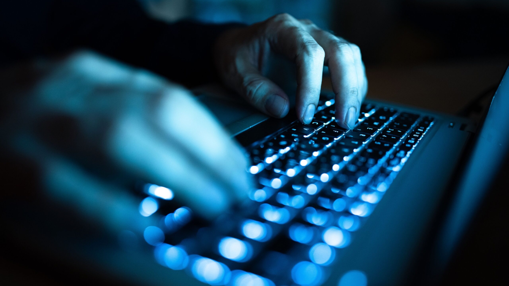 Businesswoman Typing Recent Updates On Lap Top Keyboard On Desk.