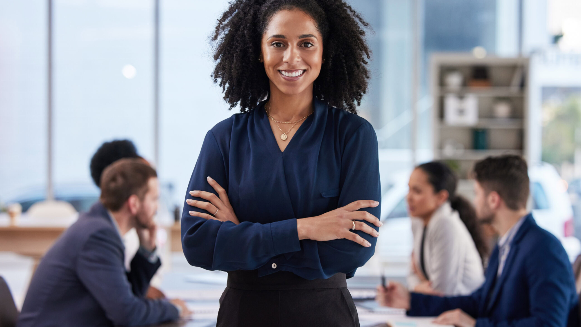 Portrait, leader and proud business woman in meeting with group for planning, discussion and proble.